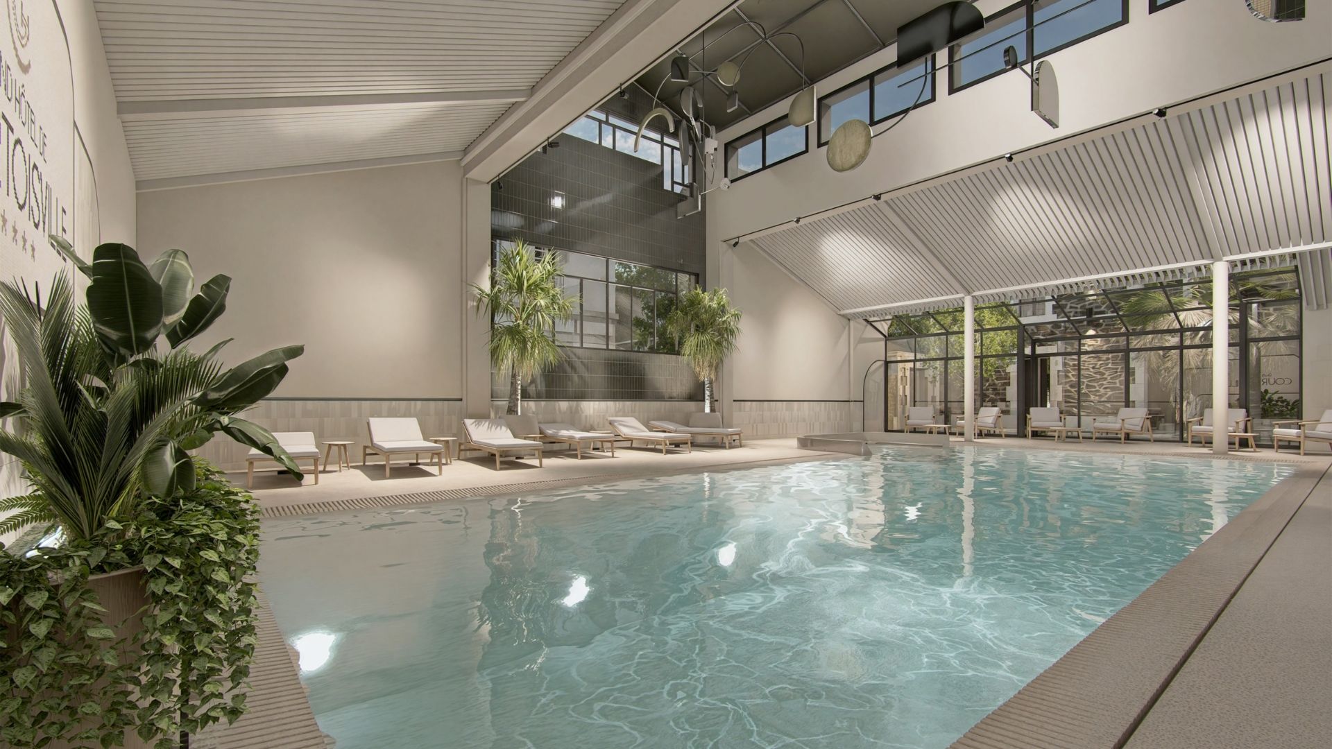 Piscine intérieure du spa au Grand Hôtel de Courtoisville à Saint-Malo, hôtel 4 étoiles en Bretagne proche de la plage.
