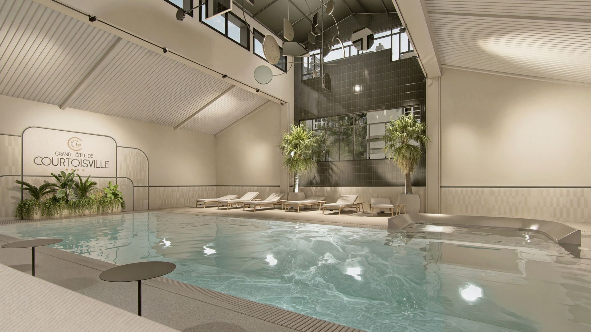 Piscine intérieure élégante au Grand Hôtel de Courtoisville à Saint-Malo, hôtel spa 4 étoiles de luxe avec hammam.