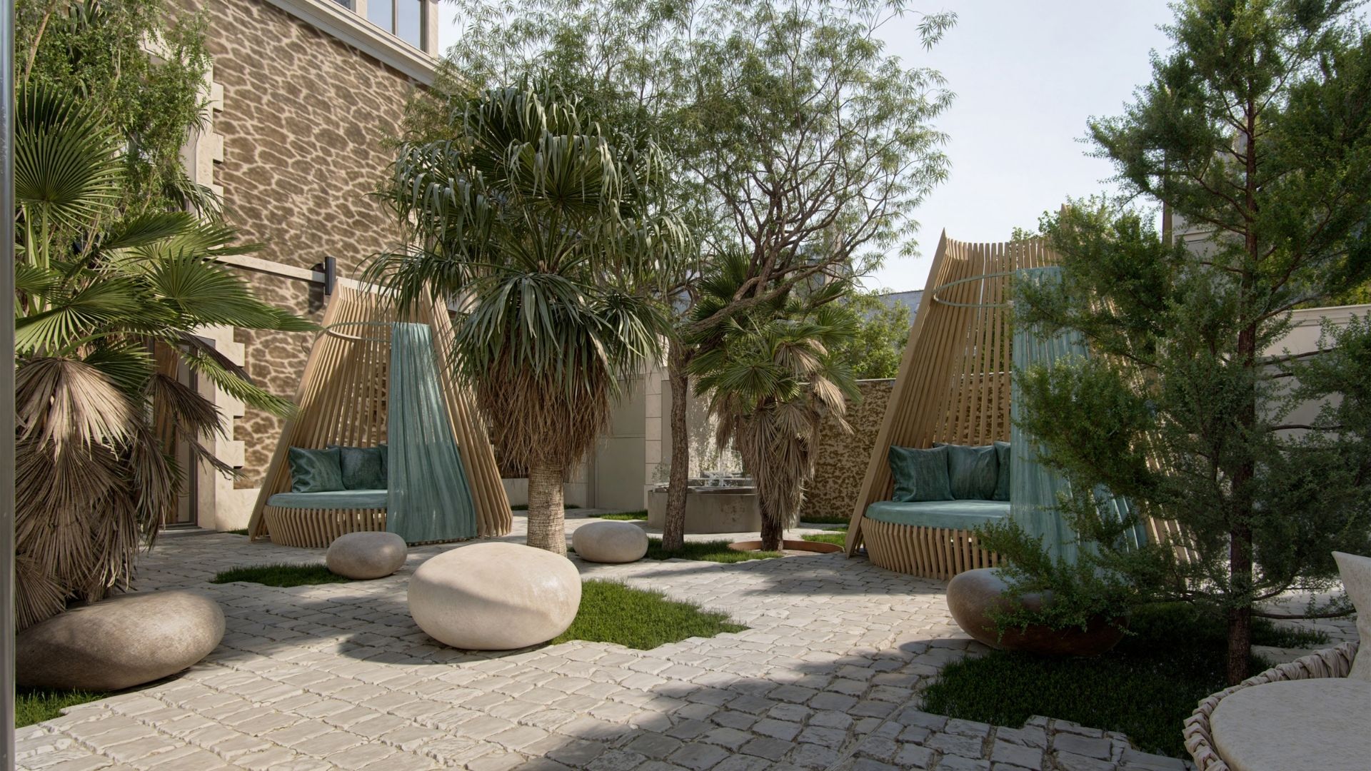 Outdoor courtyard of the spa tea room at the Grand Hotel de Courtoisville in Saint-Malo, a 4-star hotel near the sea.