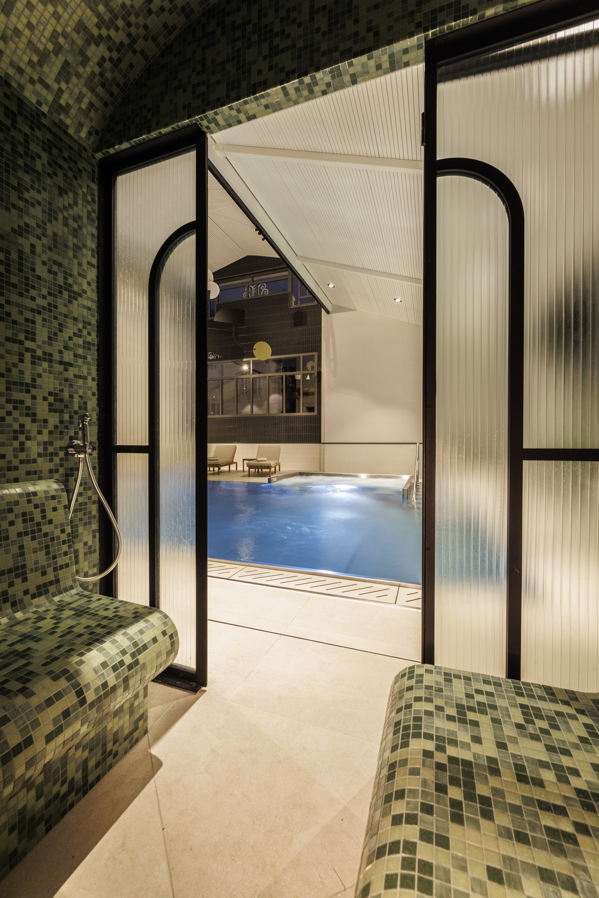 Indoor spa pool at the Grand Hotel de Courtoisville in Saint-Malo, a 4-star hotel in Brittany near the beach.