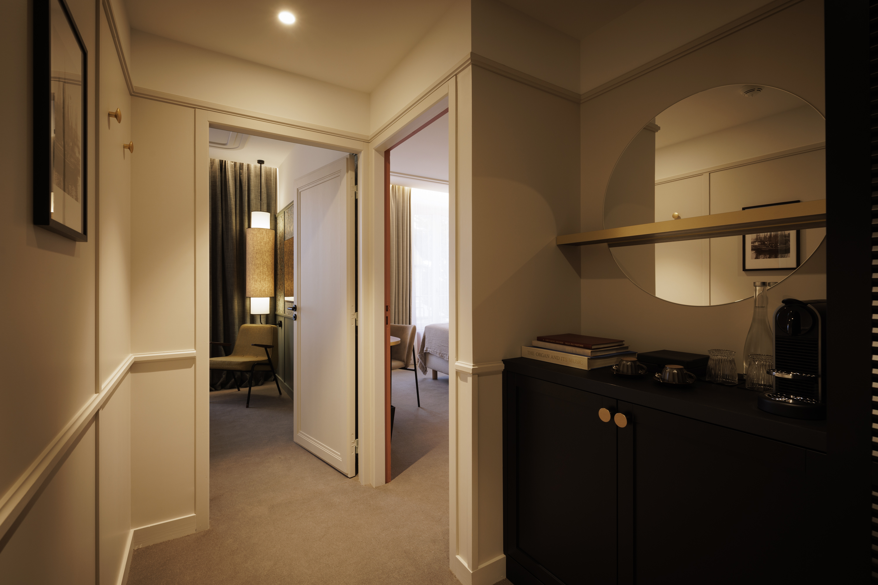 Comfortable bed in the Family Room at the Grand Hotel de Courtoisville for a family vacation in Saint-Malo.