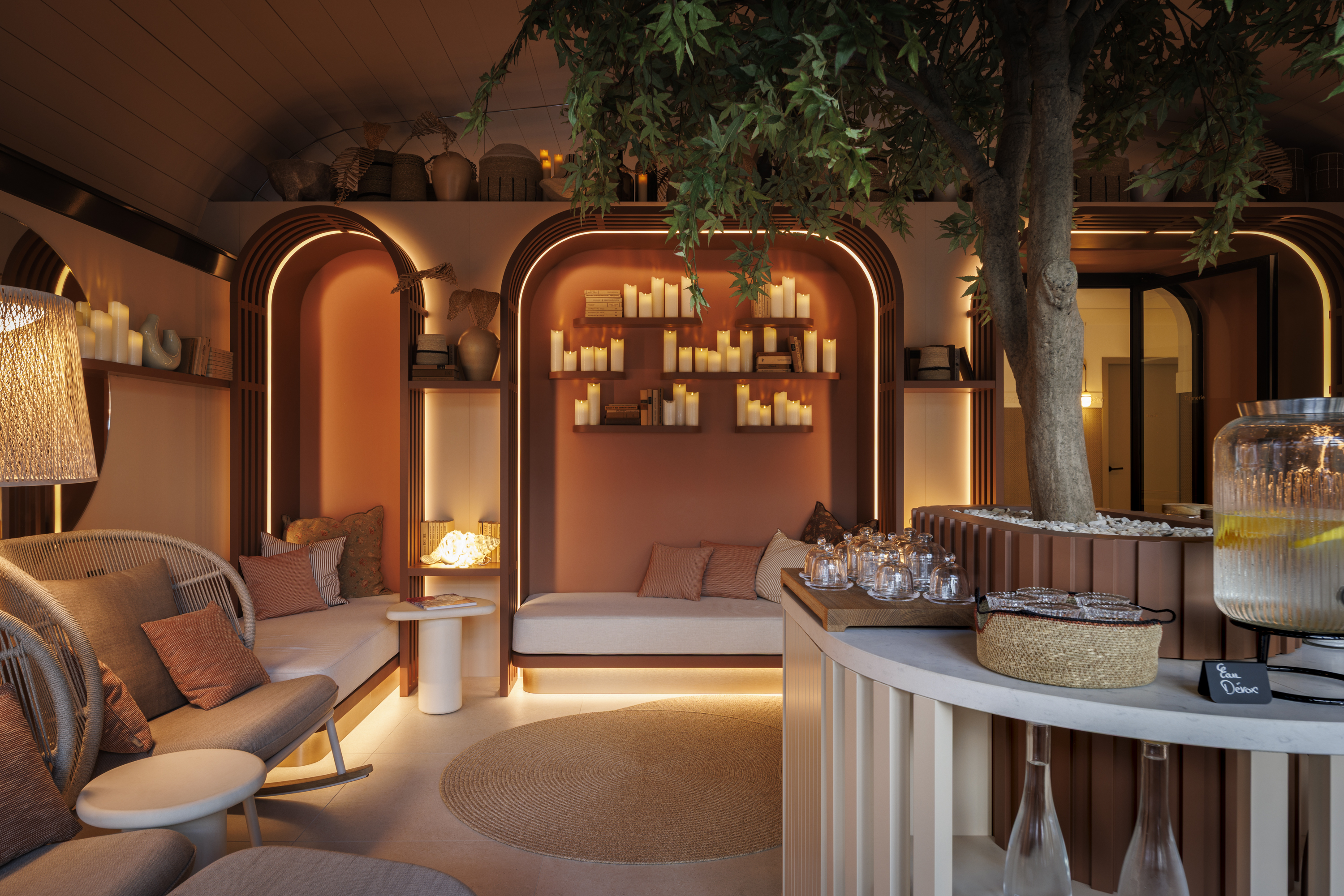 Lounge terrace with armchairs at the Grand Hotel de Courtoisville in Saint-Malo, a 4-star spa hotel by the sea.