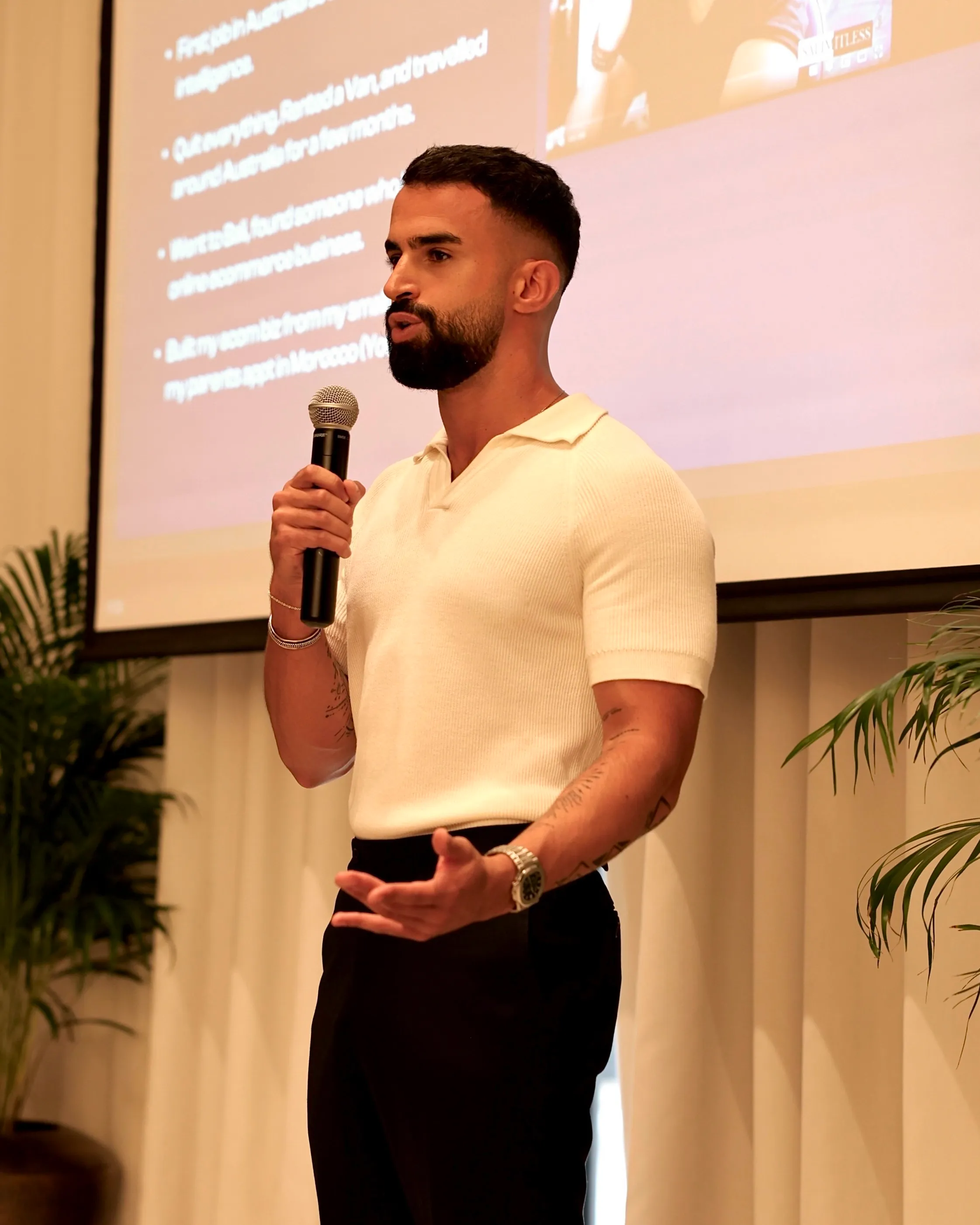 Salim Elhila giving a speach at a conference