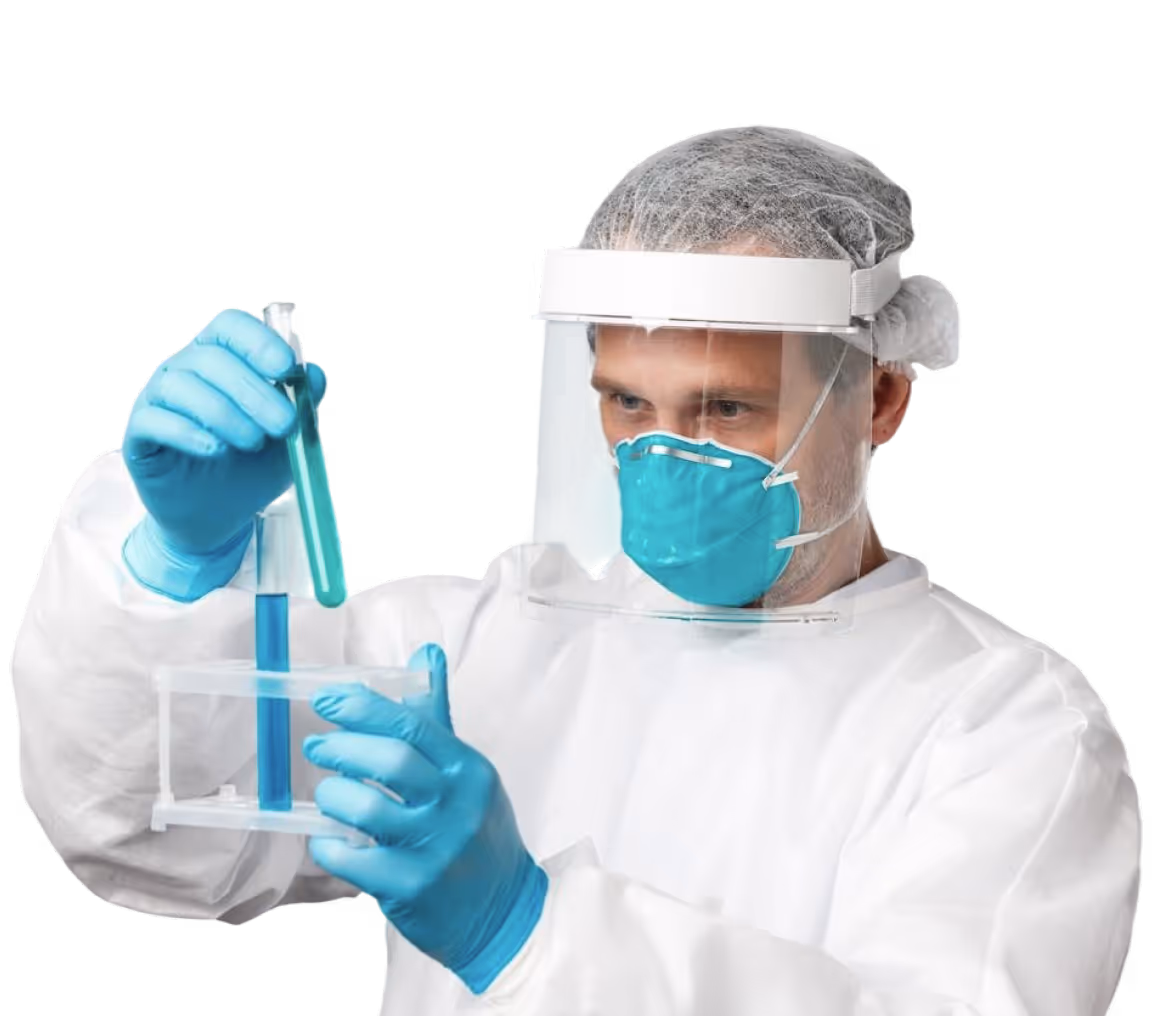 Pracownik laboratorium sprawdzający probówki. 