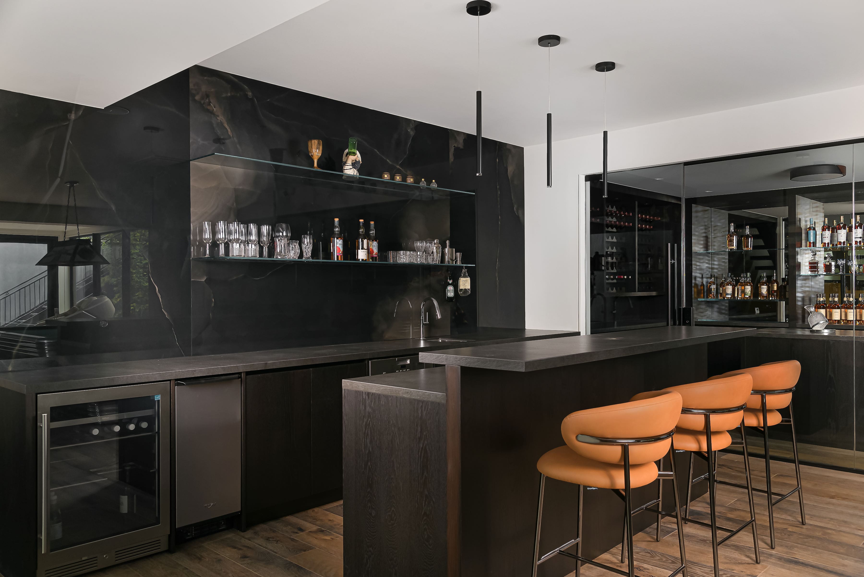 Modern kitchen with custom cabinetry and millwork in a private Richmond Hill residence by Goosen Inc.