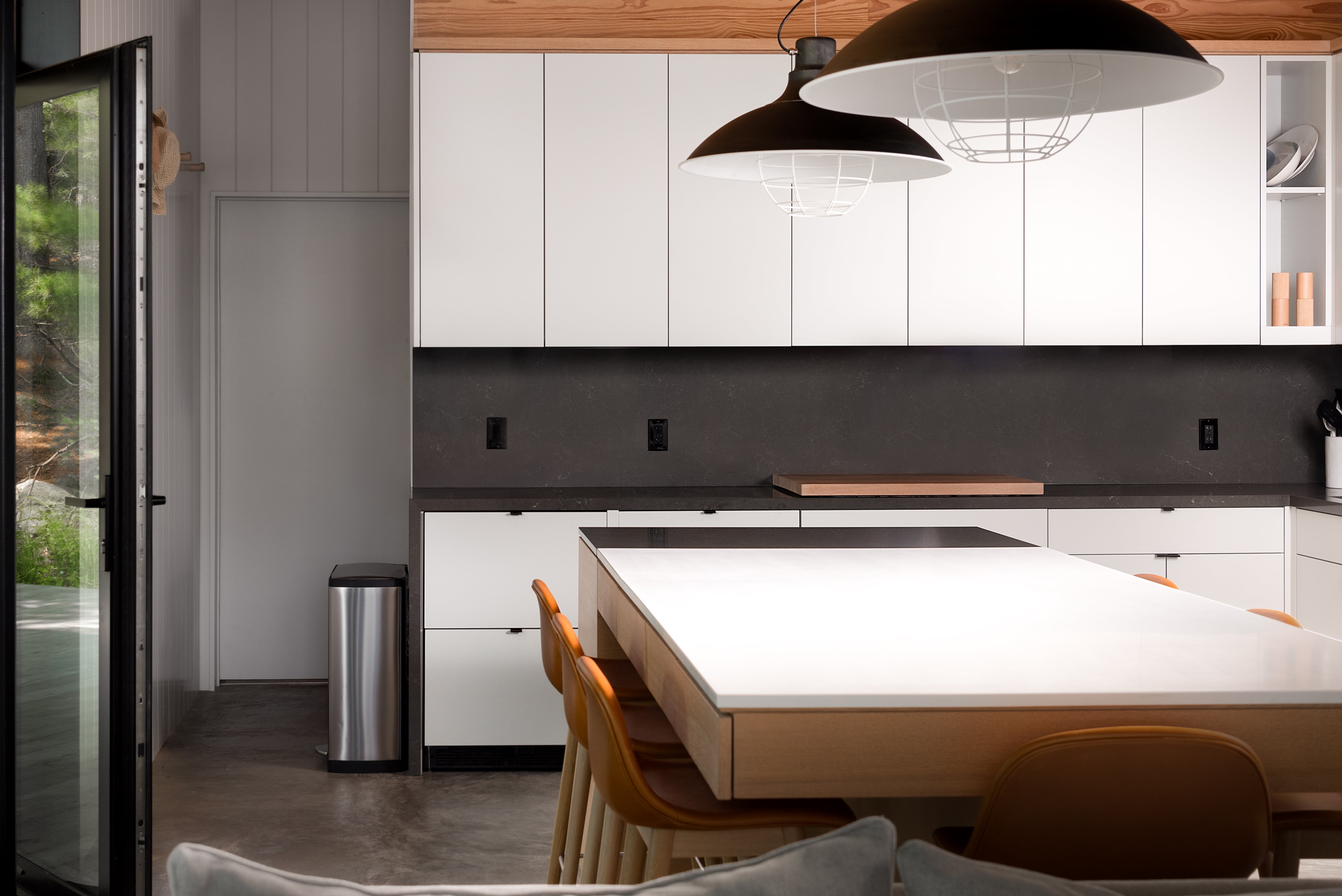 Custom millwork and cabinetry by Goosen Inc. at the Acton Boathouse on Muskoka Lake, Ontario, featuring premium wood finishes and expertly crafted built-in storage in a luxury waterfront setting.