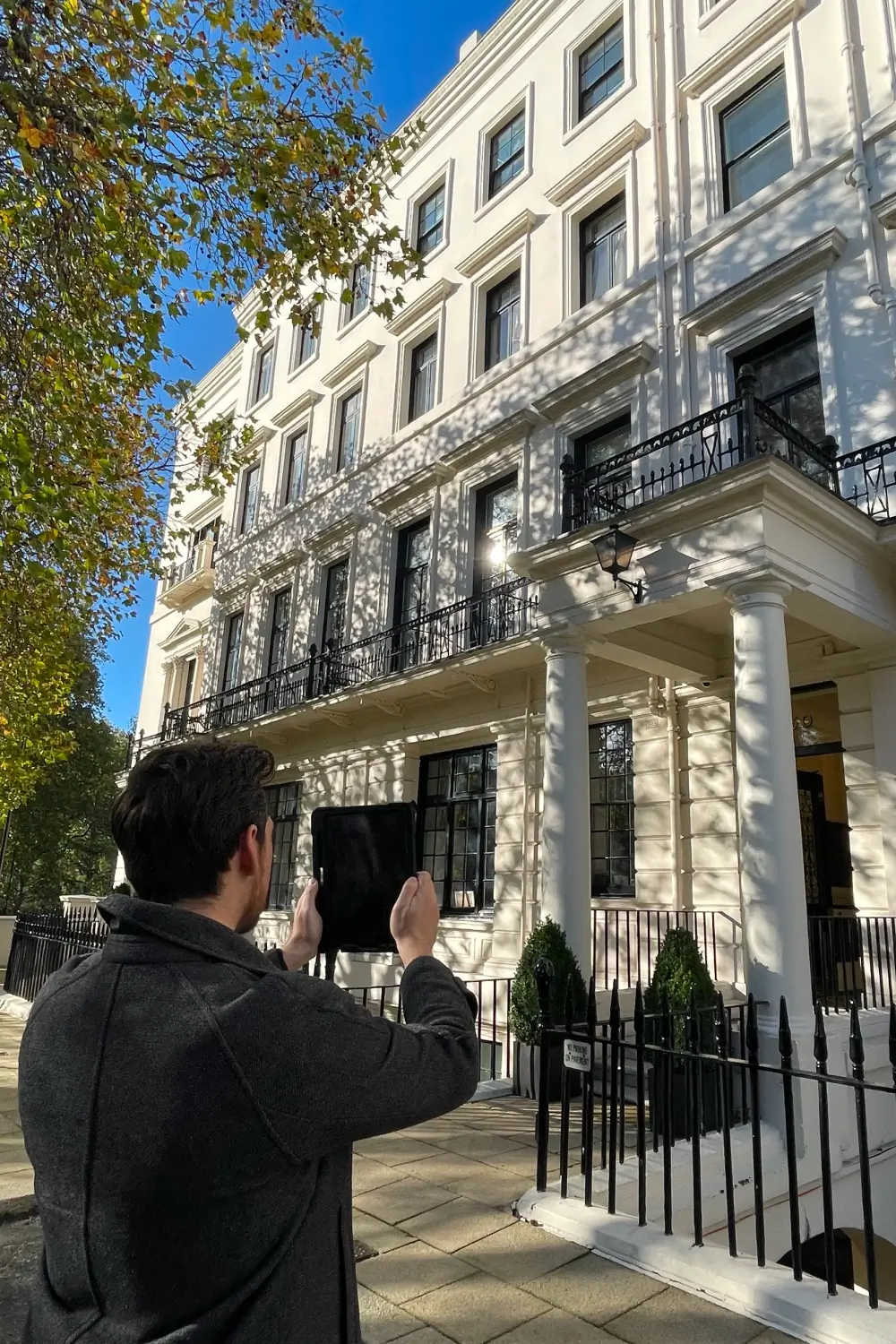 Schedule of Condition outside the property taking a picture