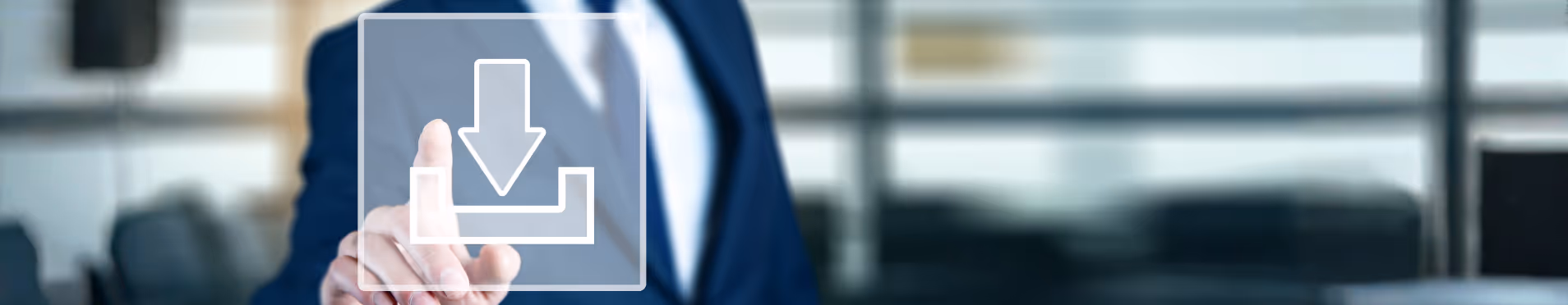 Person in suit pointing at a semi-transparent download icon on a blurred office background.