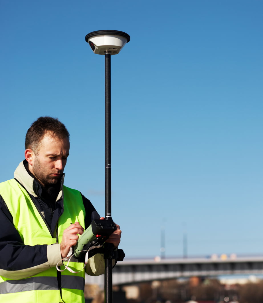 a surveyor using a GNSS system