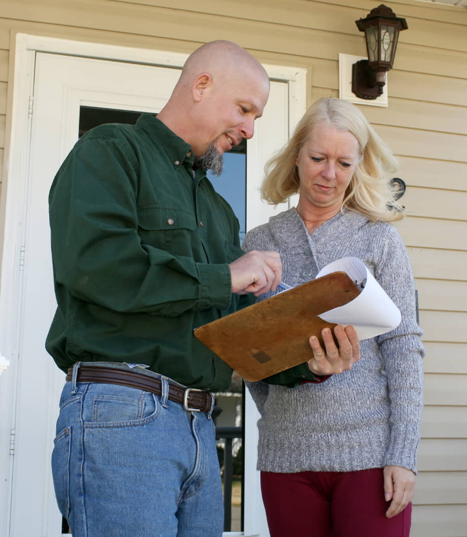 inspector talking to homeowner