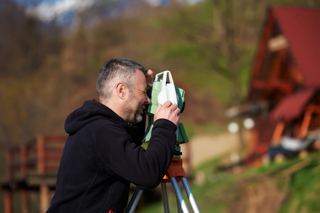 surveyor getting a reading