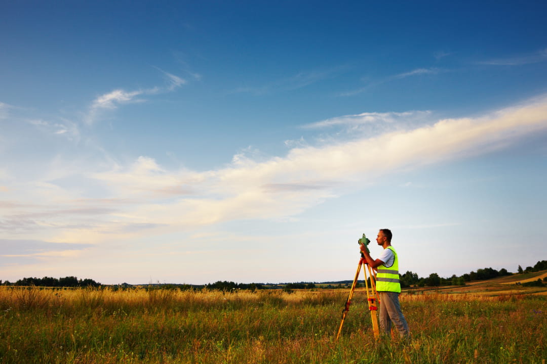 surveyor in a field