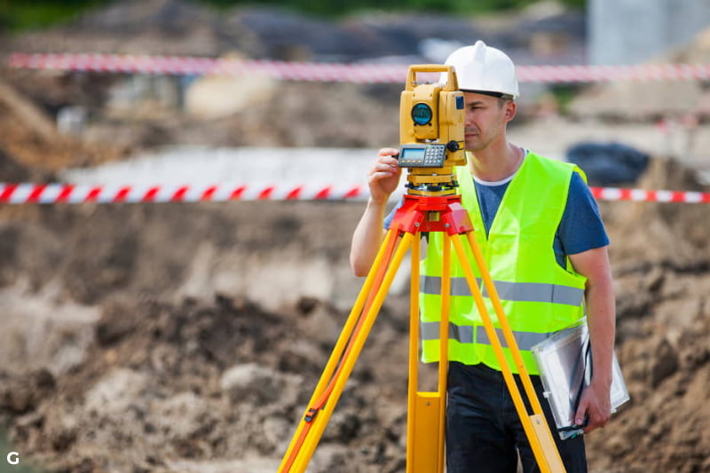 surveyor on a construction site