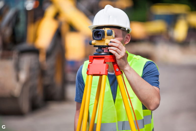 surveyor on a construction site
