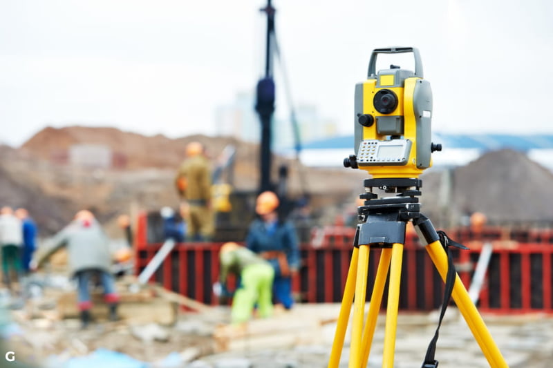 surveyor total station on construction site