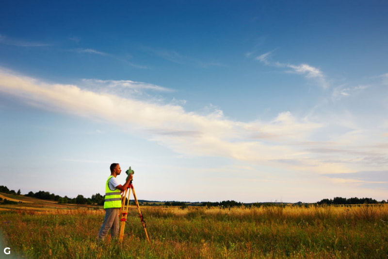 surveyor in a field