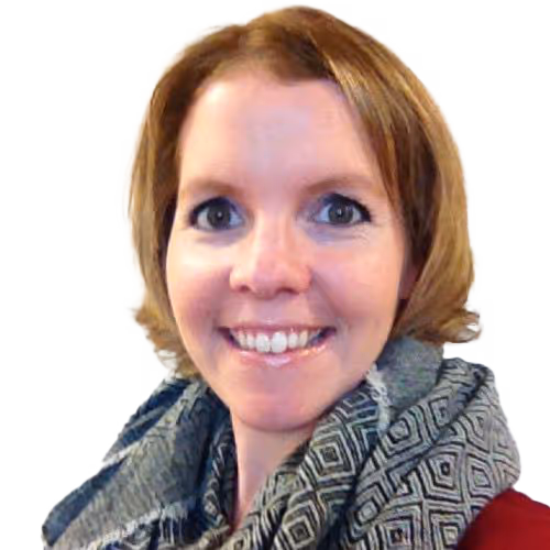 Friendly smiling woman with short brown hair and colorful patterned fashion scarf.