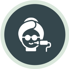 Icon depicting a person wearing glasses and a dental tool, representing dental implants or dentistry.