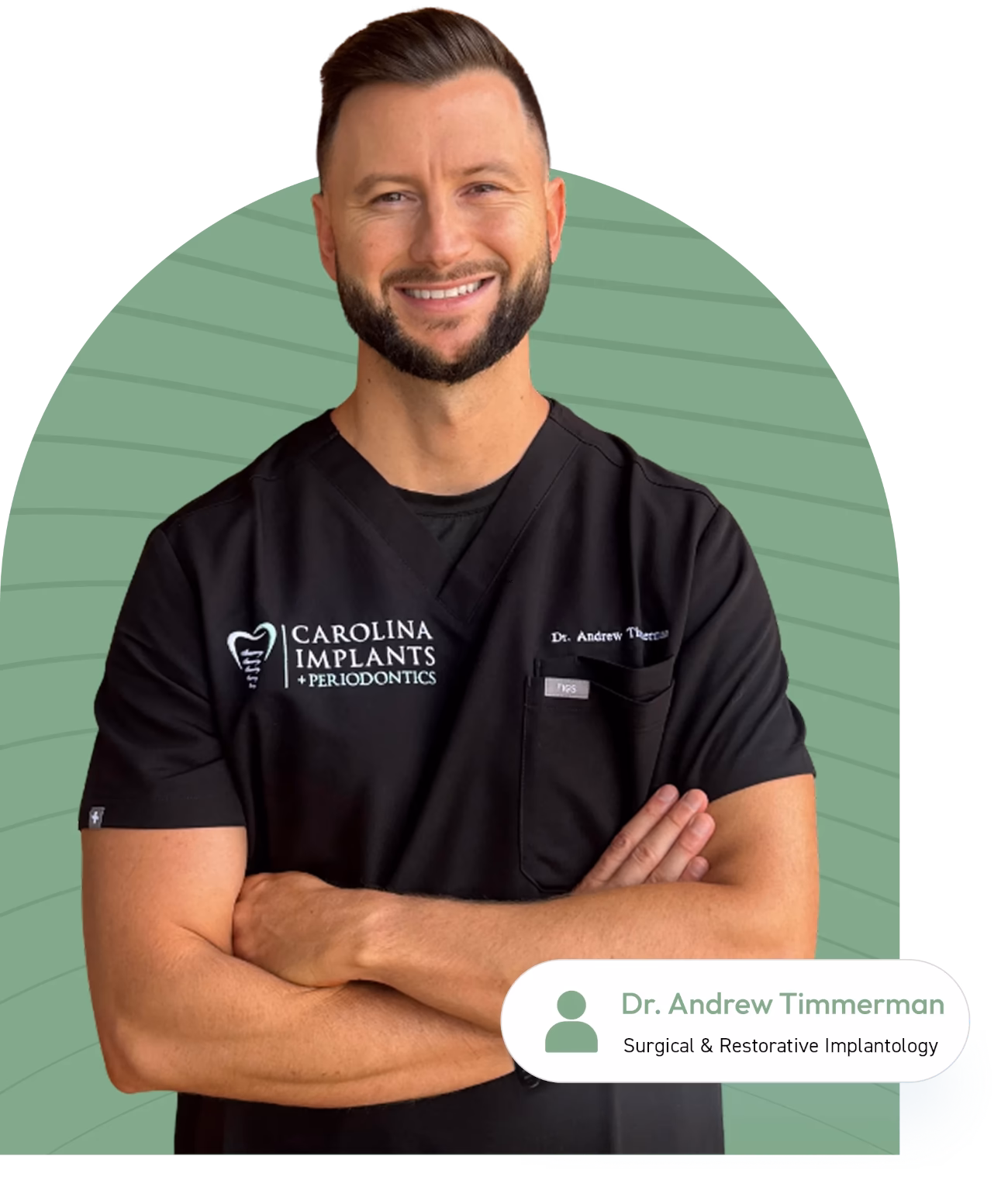 Dr. Andrew Timmerman, a DMD specializing in Dental Implants, smiling with arms crossed.
