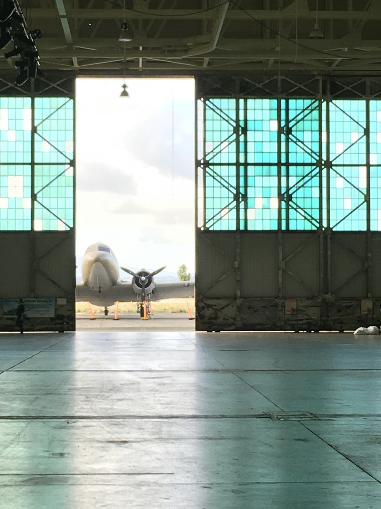 Jet airliner inside an aircraft hangar