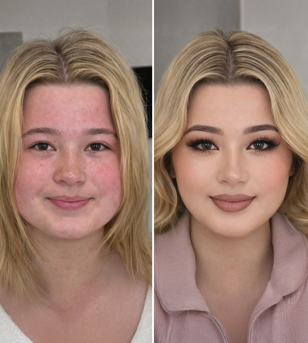 Portrait of a woman with wavy brown hair, bold brown lipstick, and shimmery gold eye makeup wearing an off-shoulder black top.