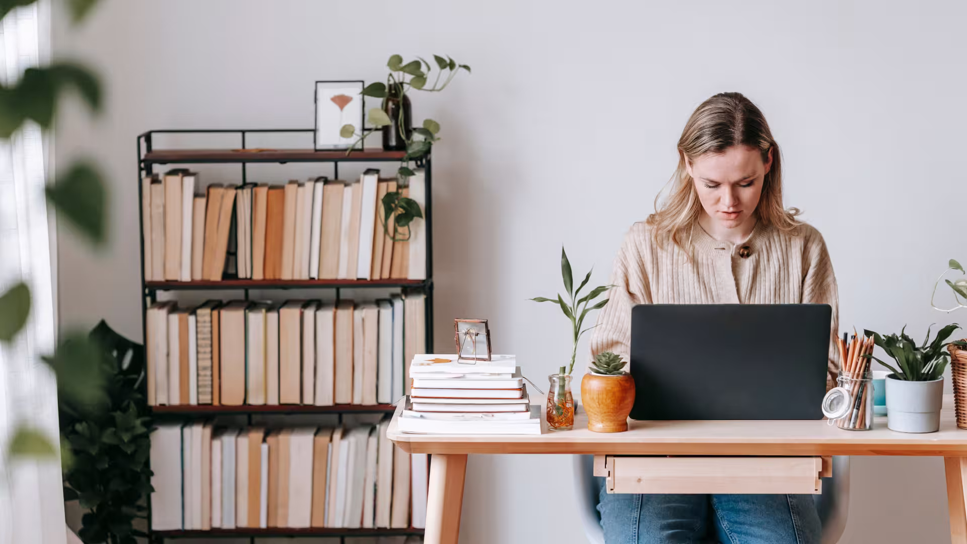 Woman working on a Laptop with real time transcription