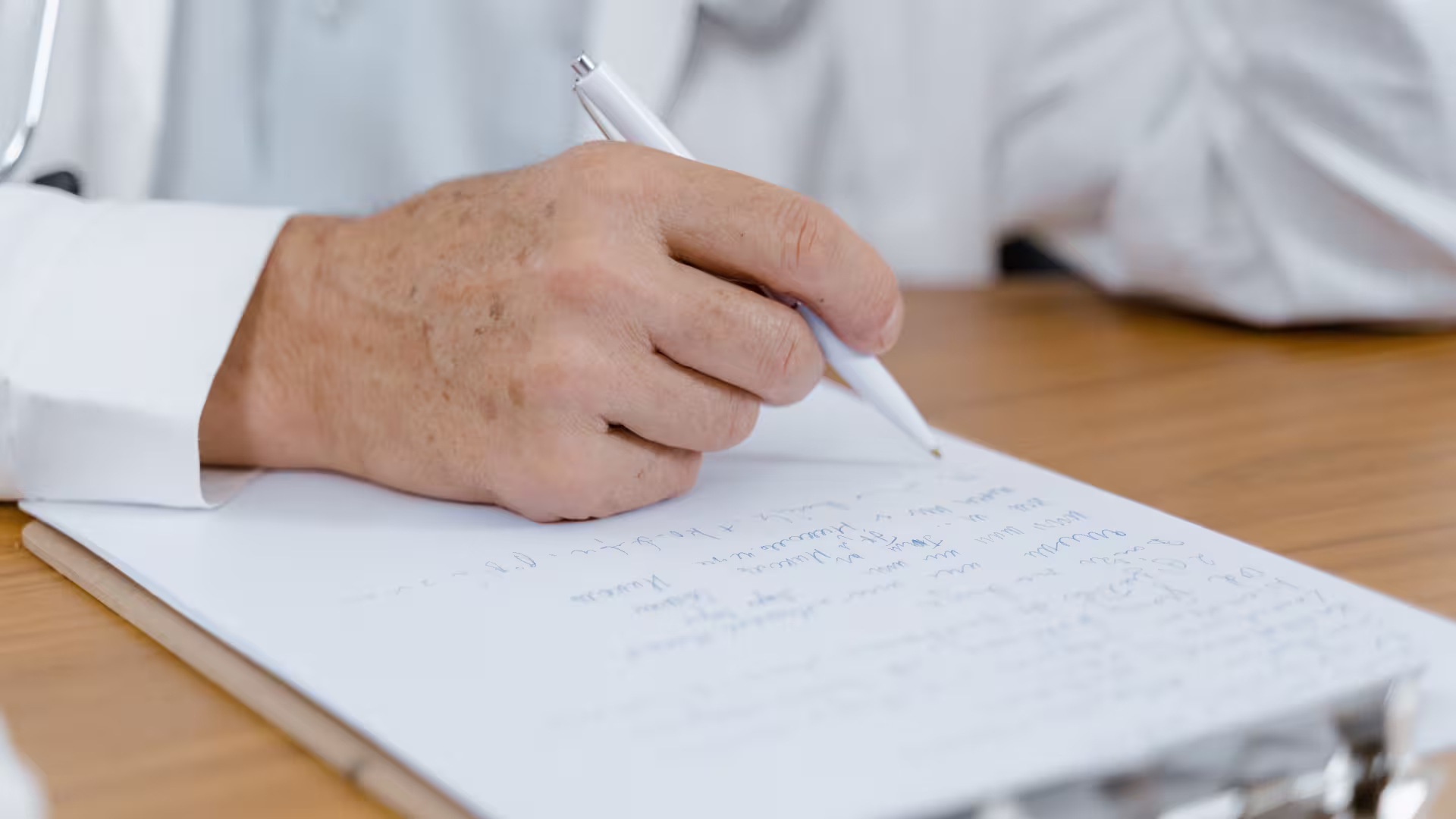 guy writing transcription by hand