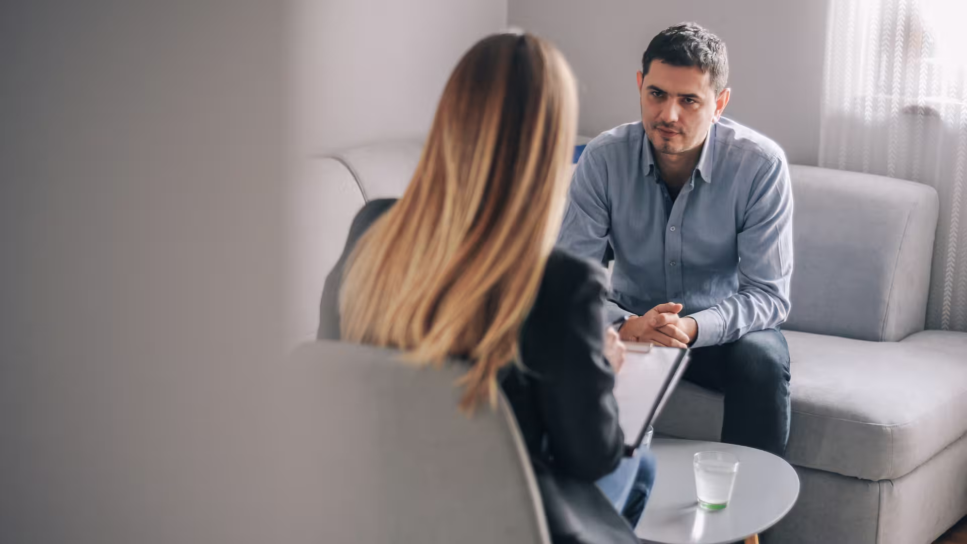 guy giving one on one feedback