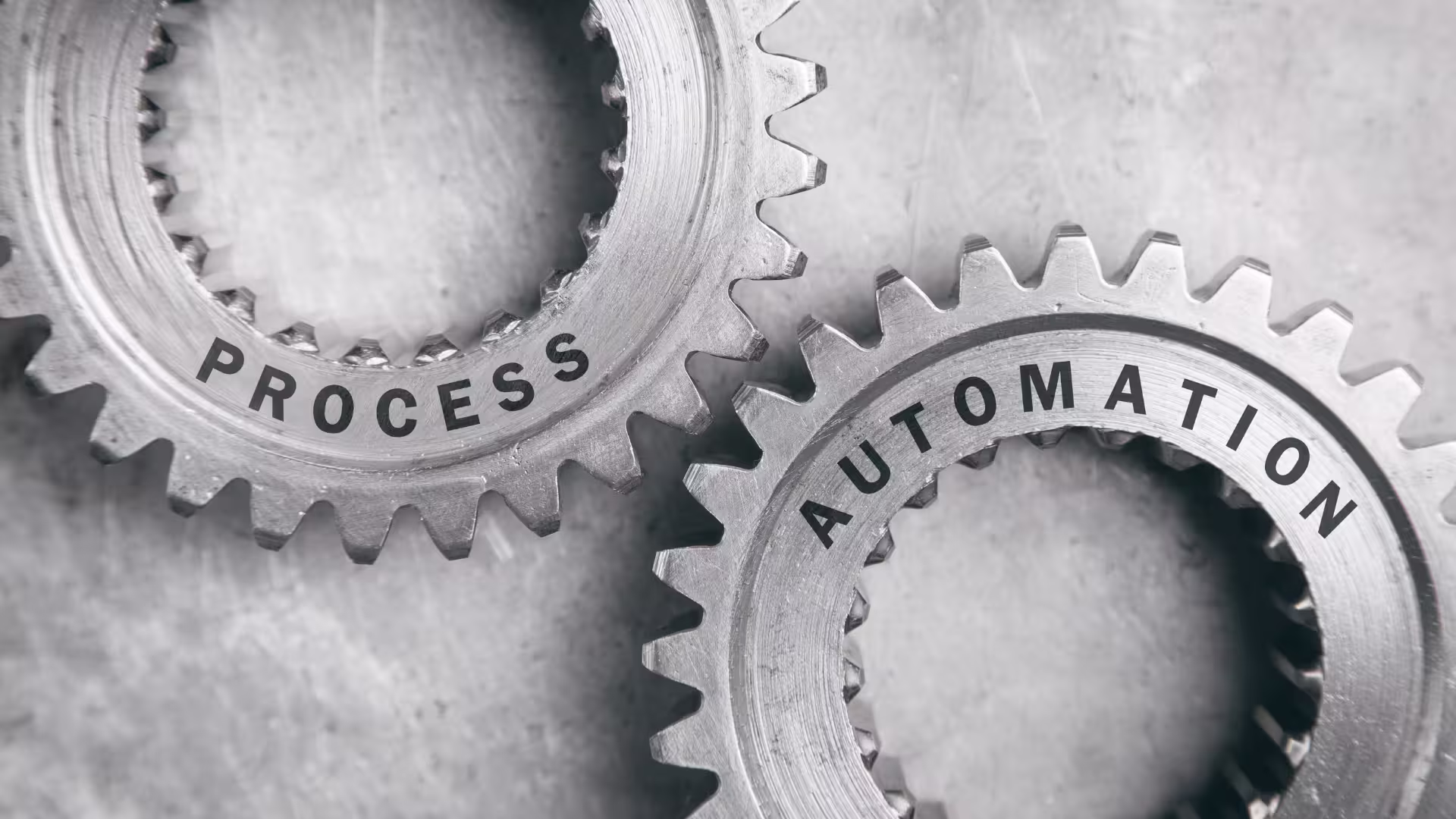 two gearwheels with process automation written on it