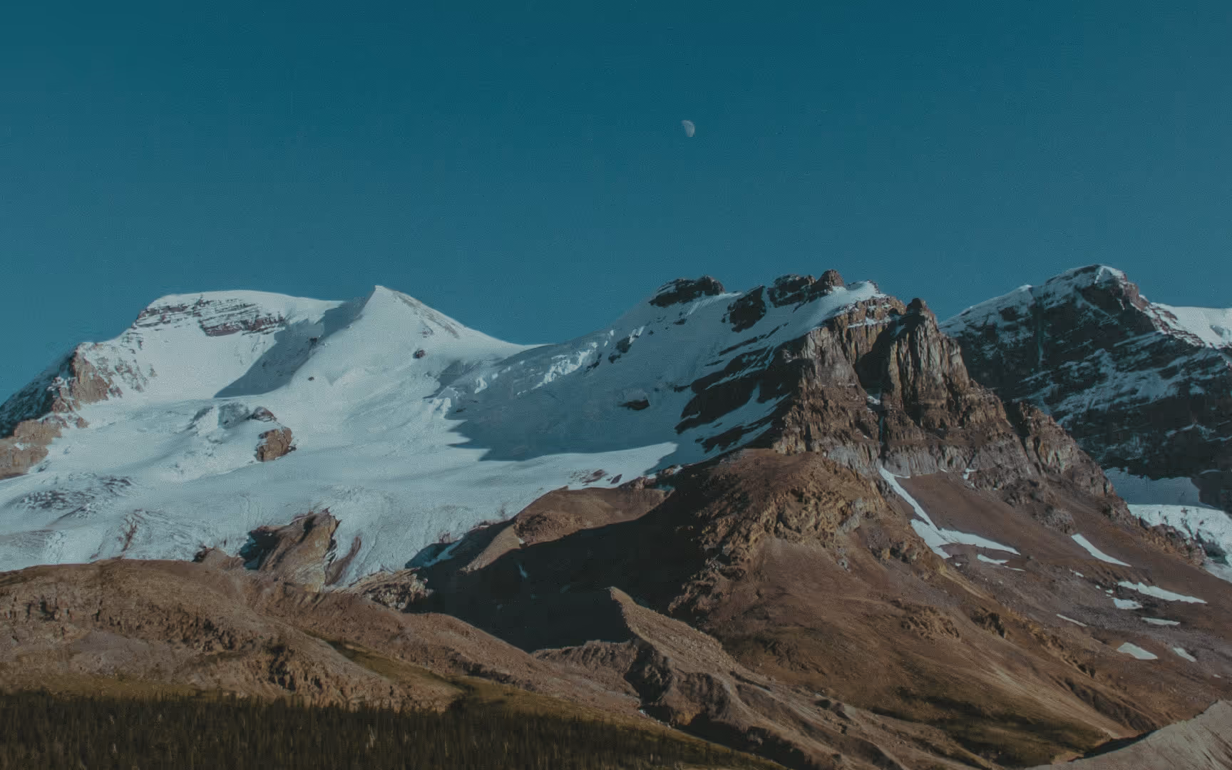 An image of mountains and the moon