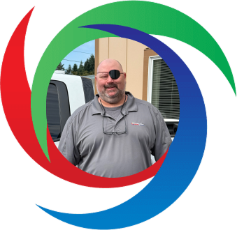 Person in gray polo standing near vehicle with colorful swirl background