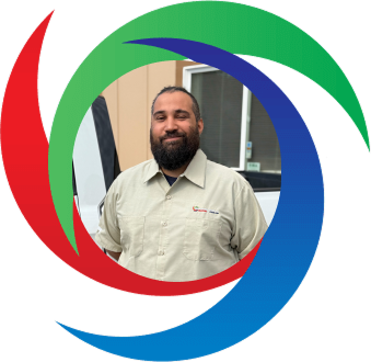 Professional man in light shirt smiling, framed by colorful swirling design