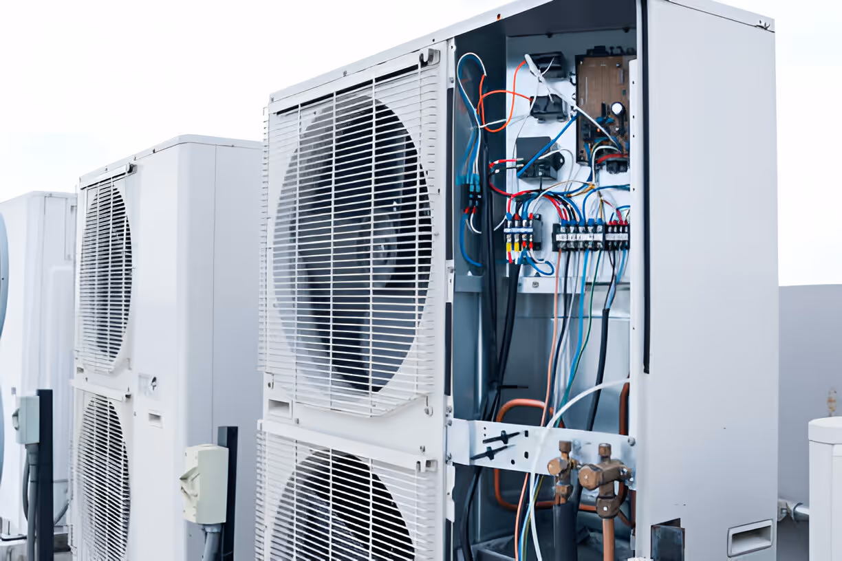 Air conditioning units with exposed electrical wiring and internal components