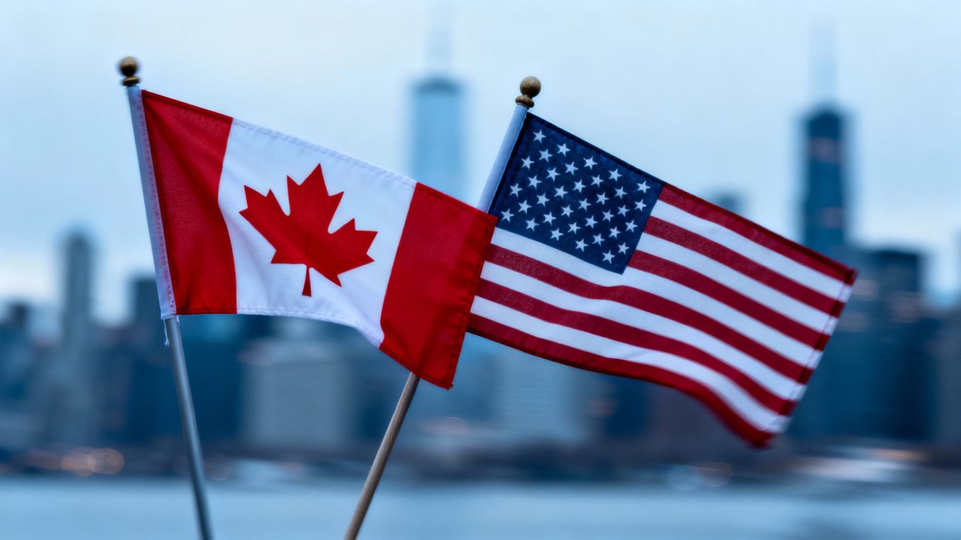 Canadian and US flags with cityscape background.