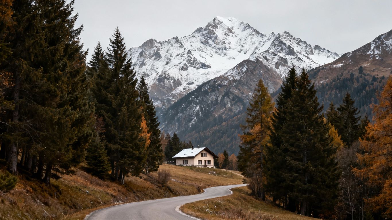 Kootenay house with mountains and trees in November.