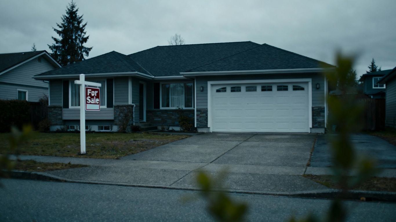 Sluggish B.C. housing market with a 'For Sale' sign.