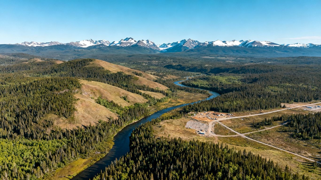 Northern BC landscape with mountains and forests.