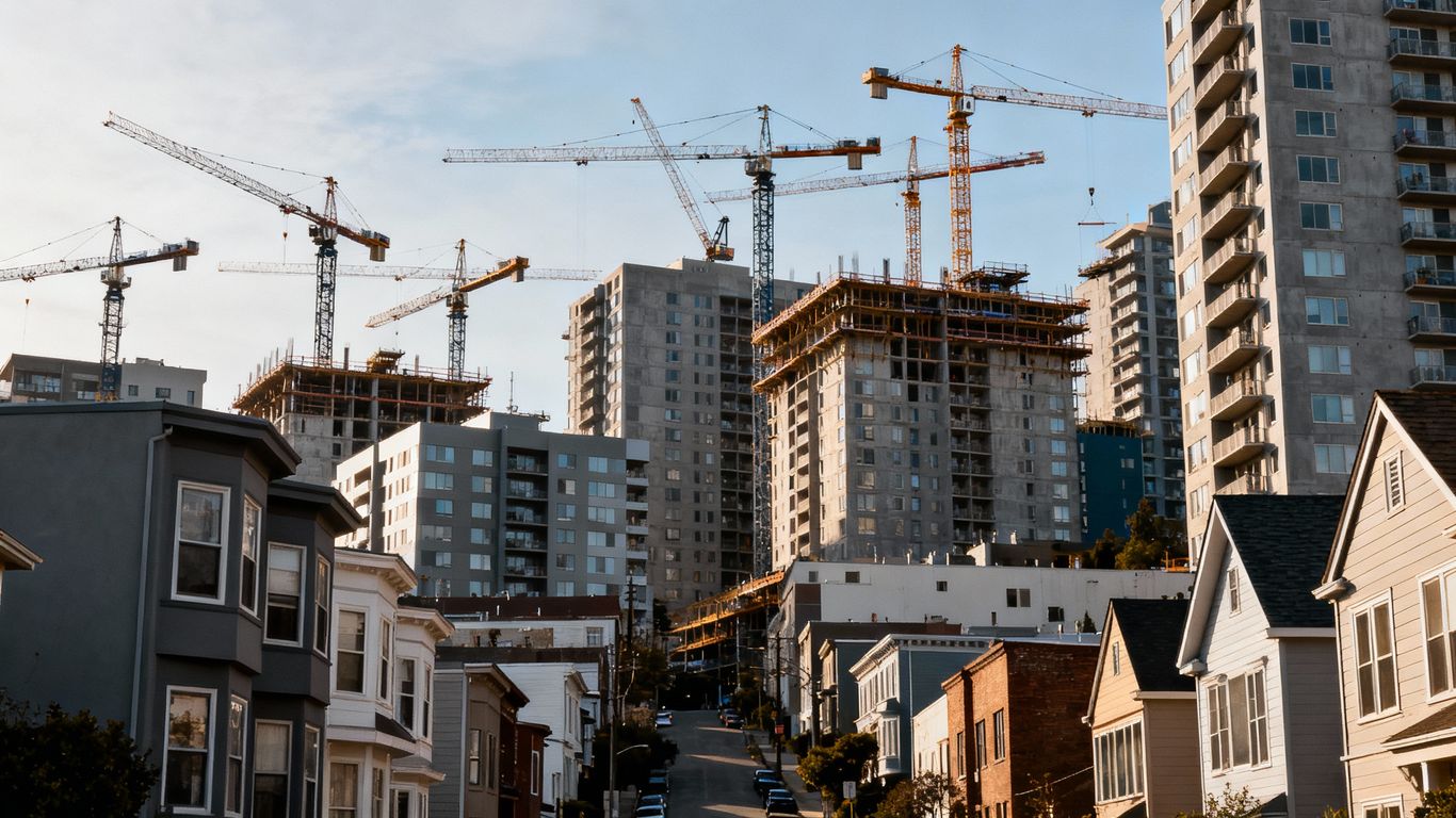 Vancouver skyline with construction cranes and diverse housing.