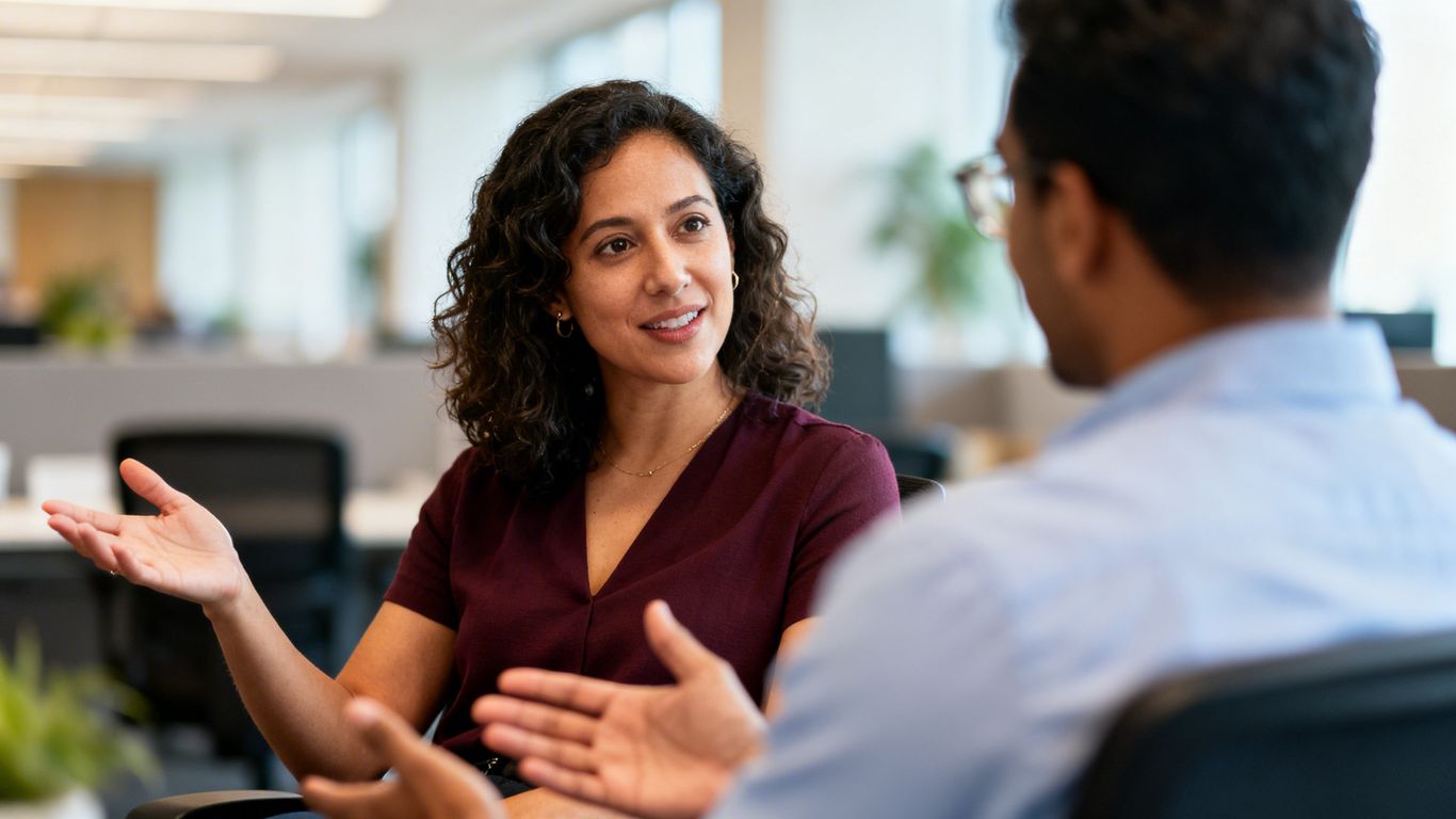 Shari and Ash in discussion, looking engaged.