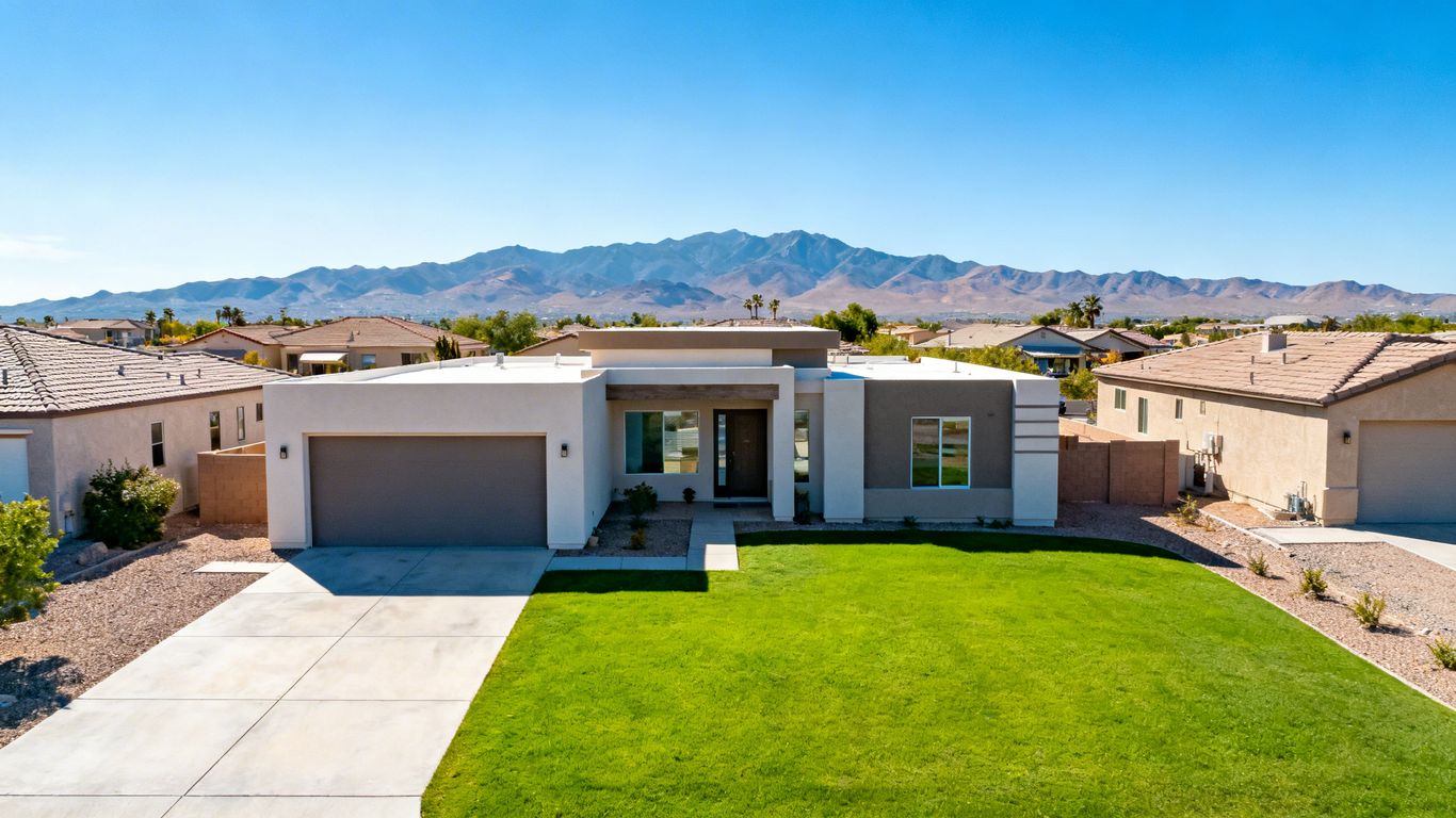 Prince George house with mountain backdrop.