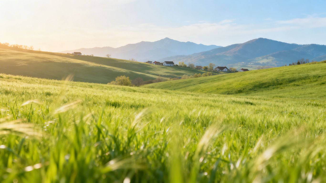 B.C. Interior landscape with houses and green fields.