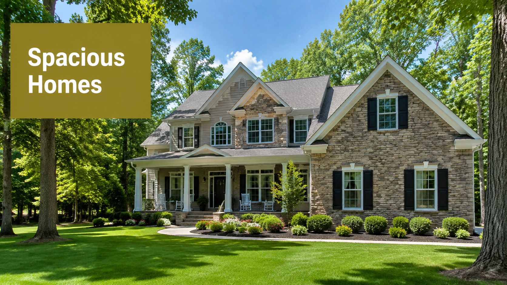 A beautiful two-story stone house with a lush green lawn and large trees in a wooded neighborhood.