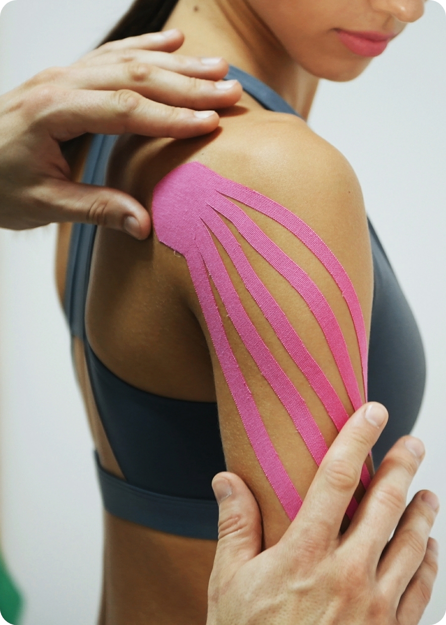 patient being treated with kinesiotape in ottawa at activeedge spine & sport with Chiropractor Dr. Nick Necak, DC, CCSP