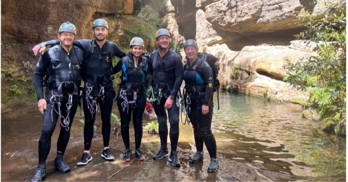 Confident participant during canyoning team cohesion activity in the Blue Mountains, Sydney