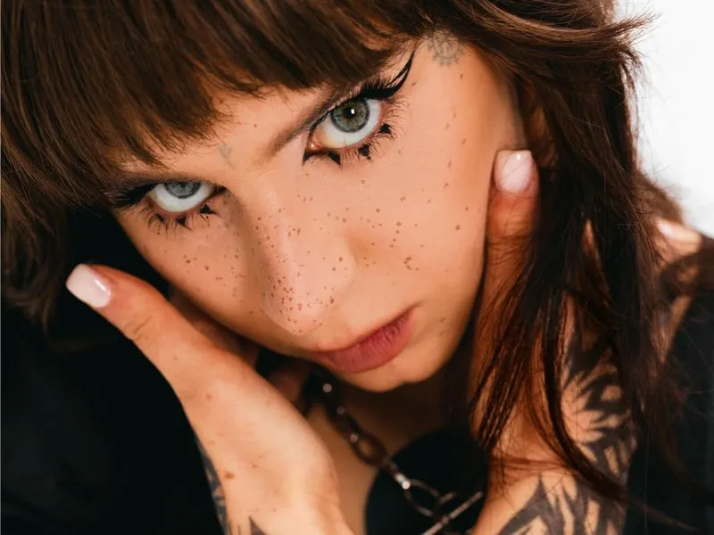 high angle goth teenager posing studio