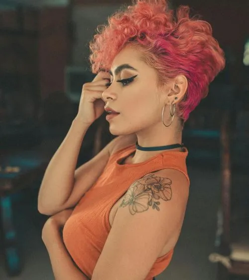 woman in orange tank top