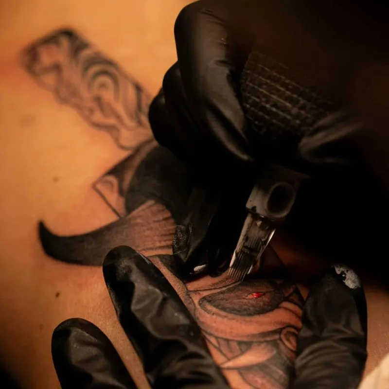 person getting a tattoo