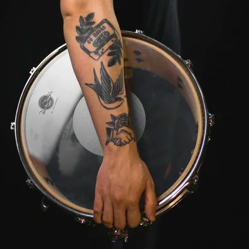 drum held by a man