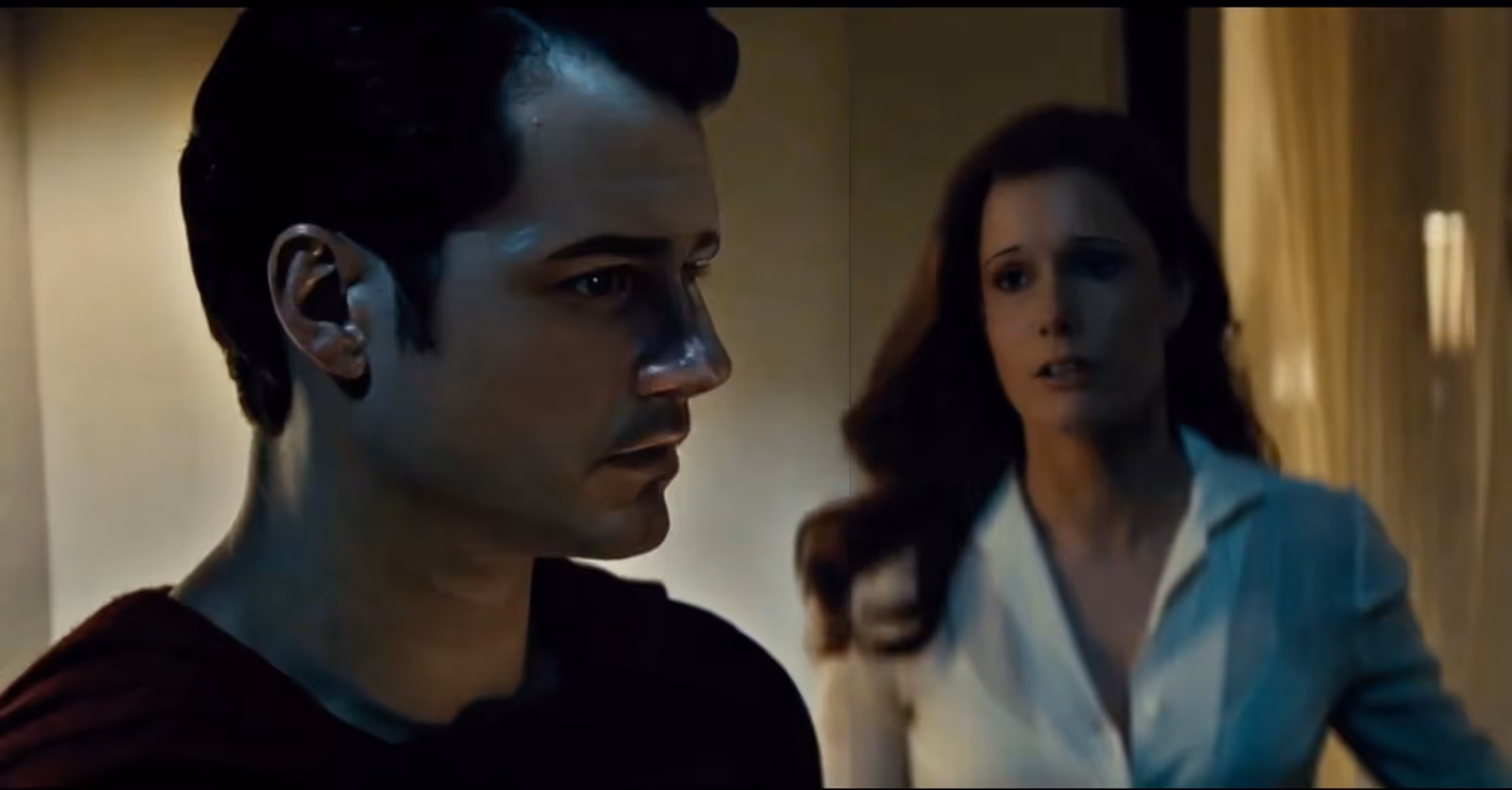 image of a superman, talking with a woman