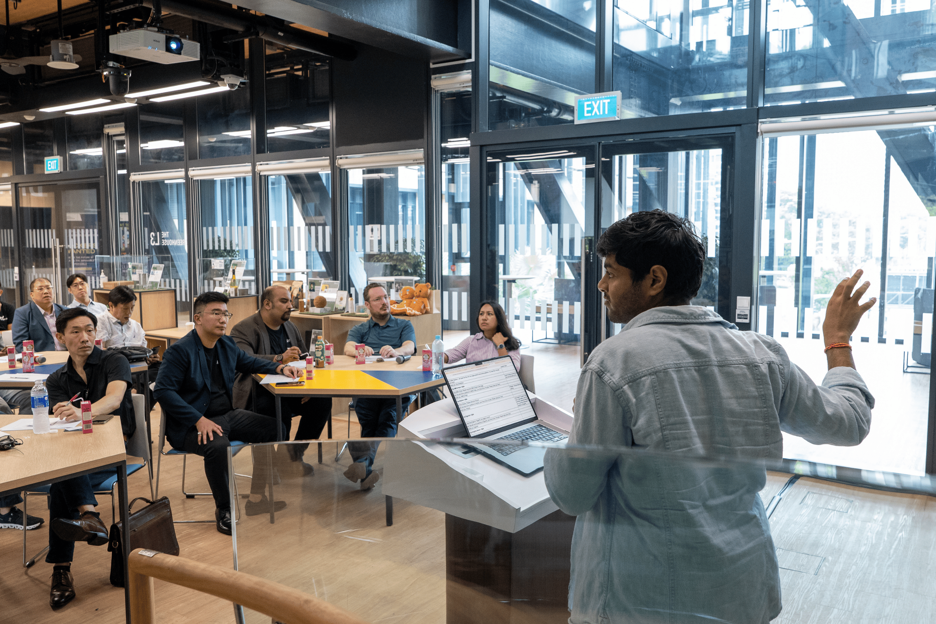 Man giving a presentation to a group of people